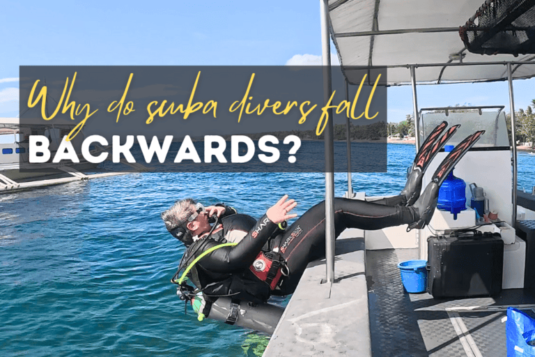 Why do scuba divers fall backwards