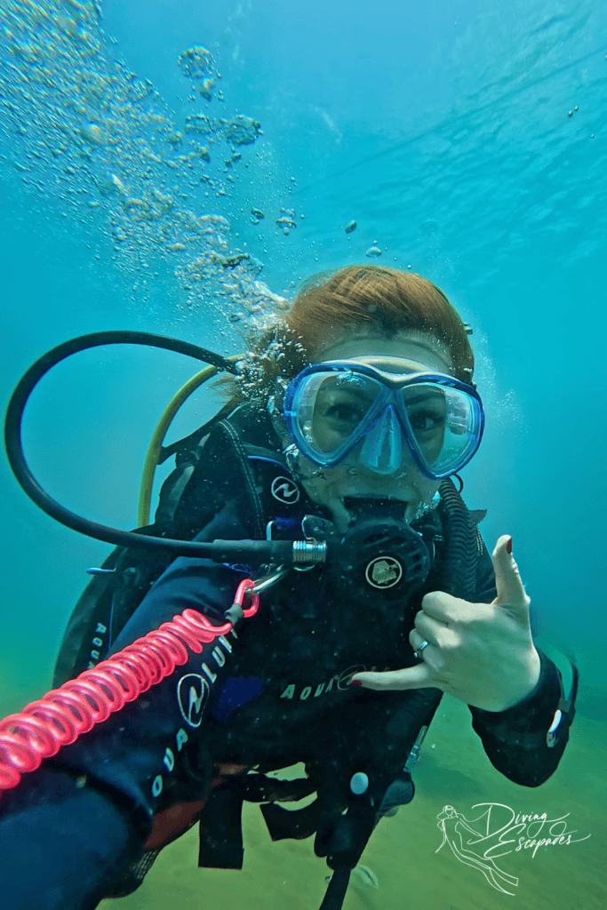 Lorie Za of Diving Escapades in SCUBA gear while diving in Dauin 