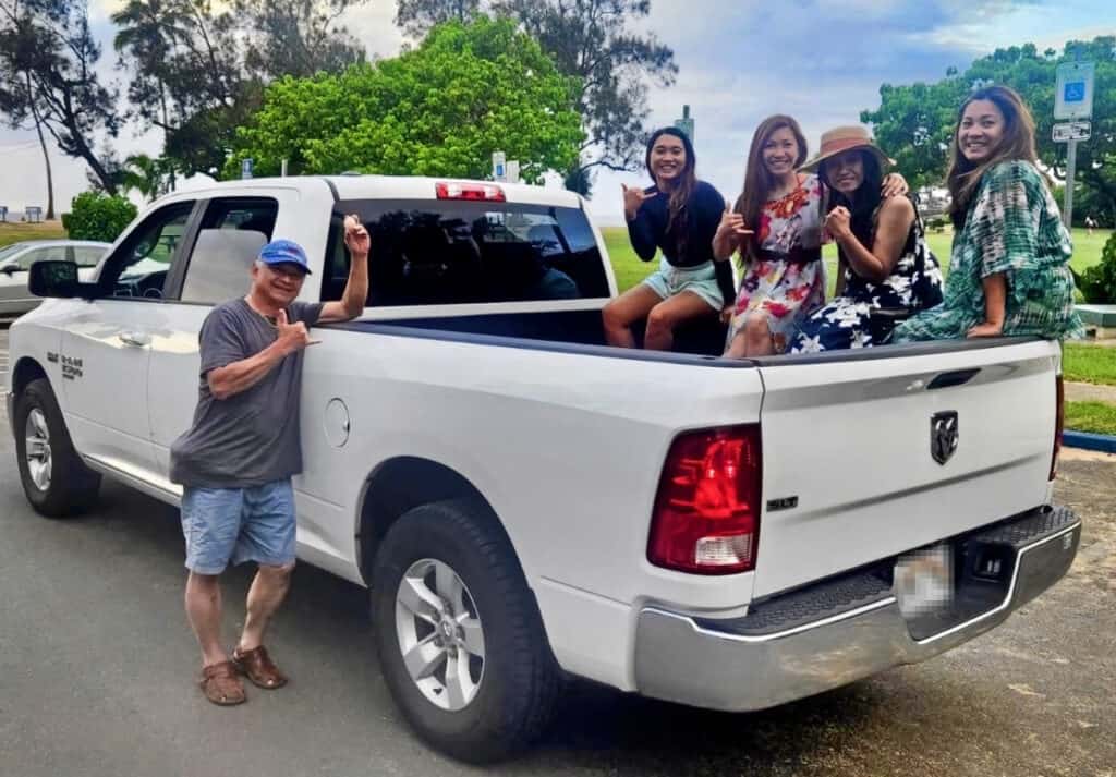 My family and I in a rental car in Oahu