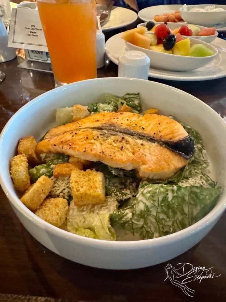 Salmon Caesar Salad and Fruit bowls during Carnival Cruise's Sea Day Brunch